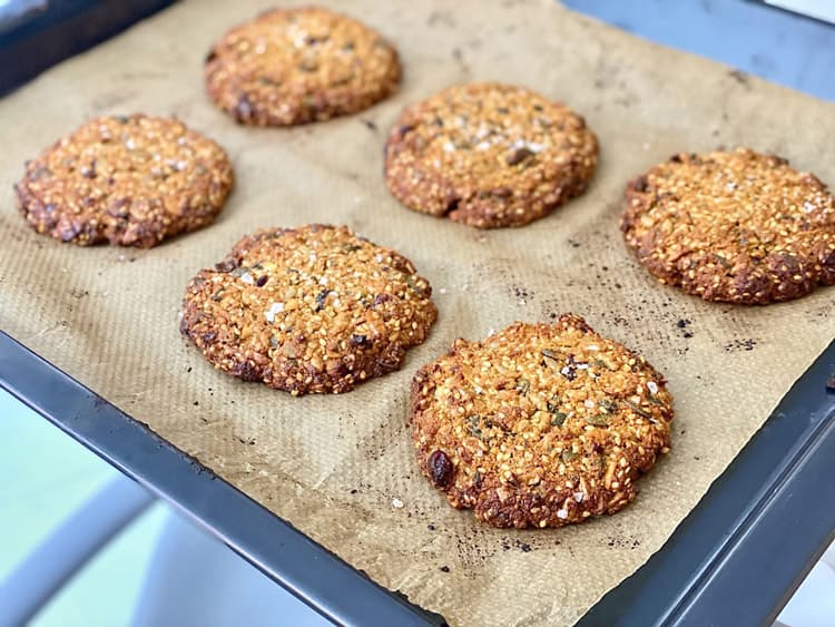 A tray of nut, fruit and seeded cookies that are a delicious recipe for easy digestion, aimed to eat in the morning.