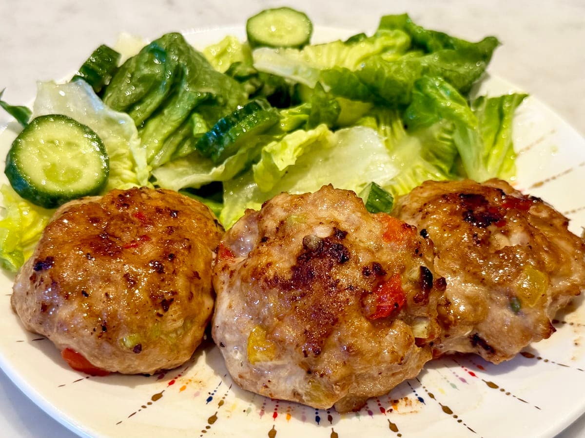 Asian chicken patties with a side salad